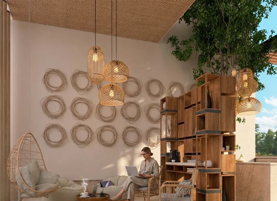 Render del coworking con sillones, librero de madera y lámparas de fibra natural