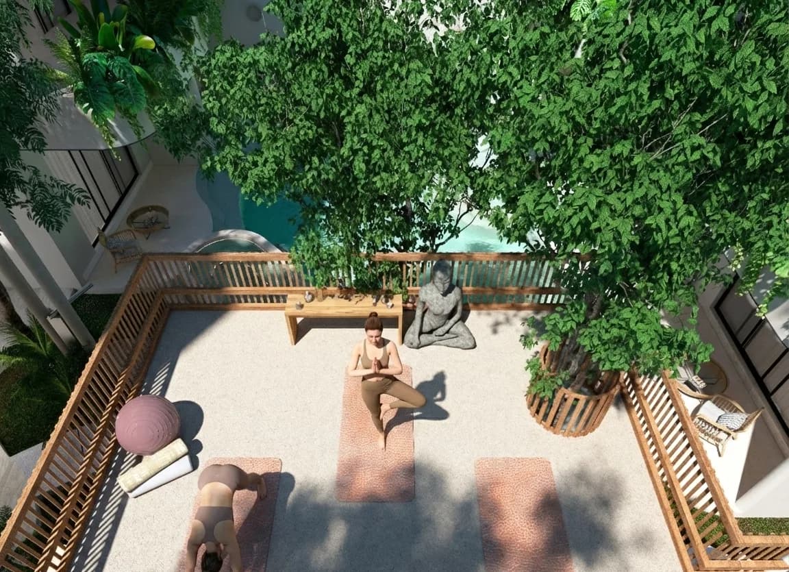Render de la zona wellness con tapetes de yoga bajo un árbol